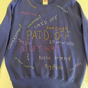 Promotional sweatshirt for "A Complete Unknown"  made by Levi's